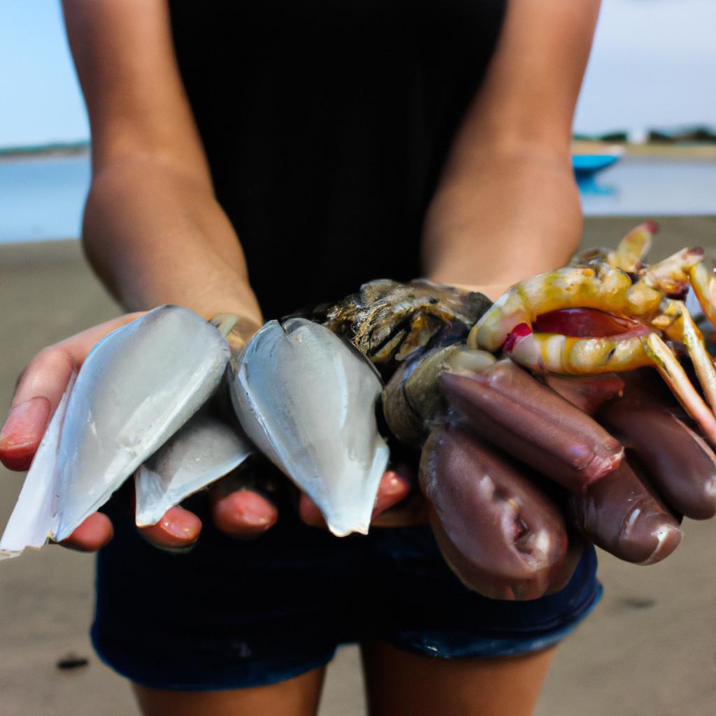 Person holding fresh seafood products